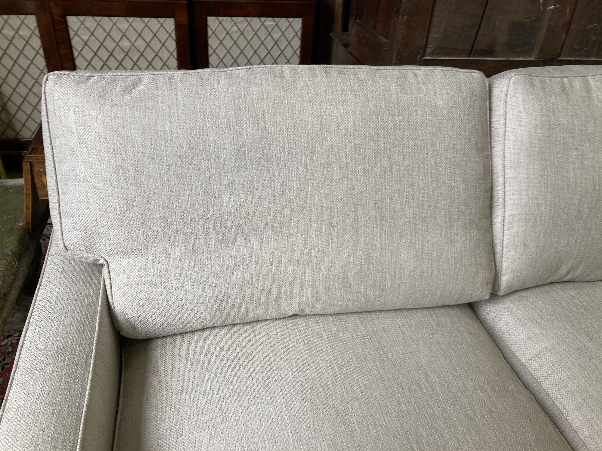 A modern contemporary two-seater sofa, length 206cm, width 102cm, height 98cm